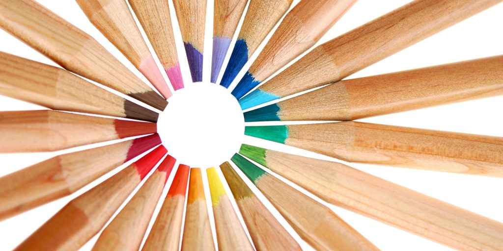 colored pencils lined up like a color wheel