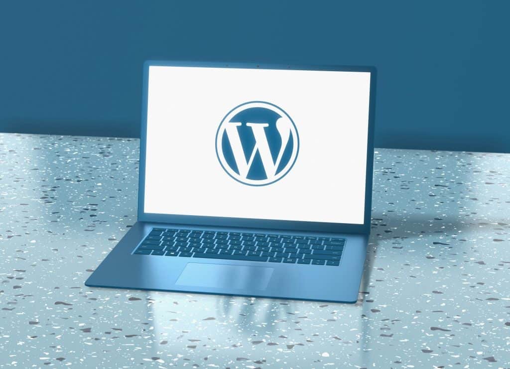 laptop with wordpress logo on the screen